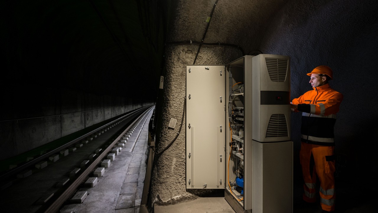 Maintenance work on a fire detection system in an access tunnel leading to the Gotthard Base Tunnel.