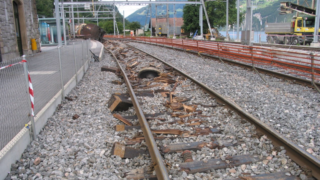 Damage to infrastructure due to a derailment caused by a broken axle.